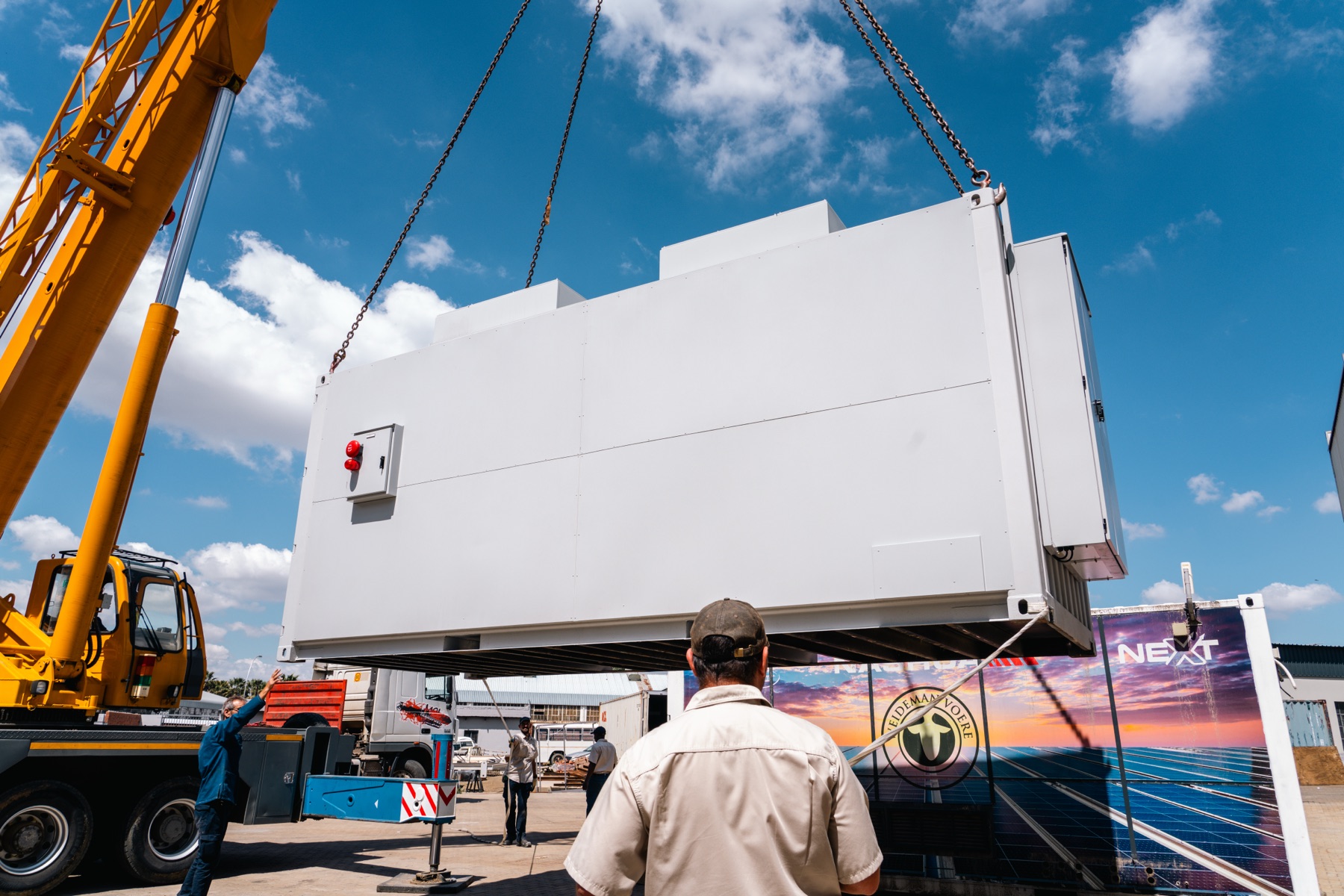 Containerised battery unit being craned into place at Weideman Voere