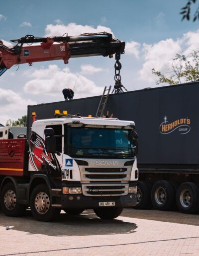 Crane moving a container