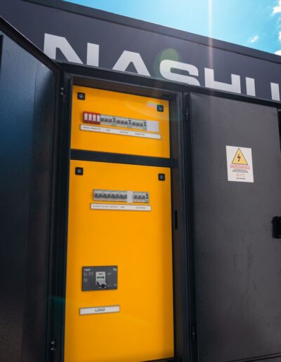 Yellow circuit breaker on Nashua container