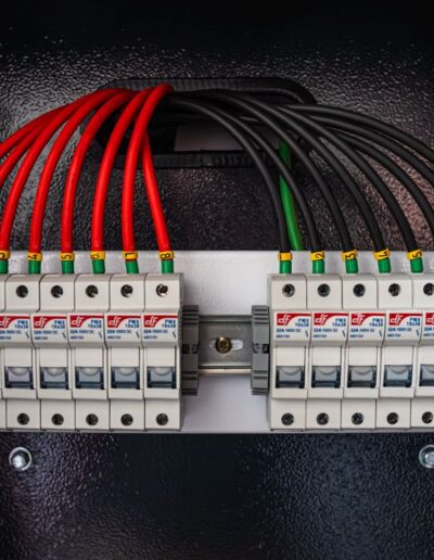 A close-up shot of an electrical panel featuring multiple Miniature Circuit Breakers