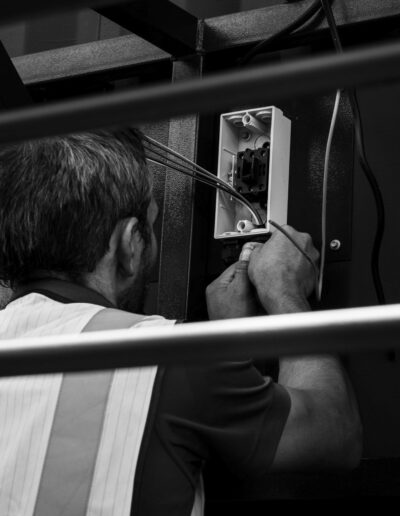 Engineer working on electrical components