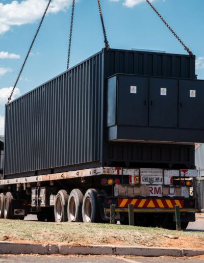 A truck moving a container