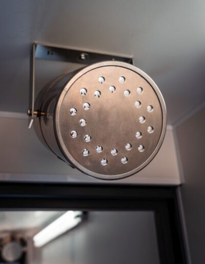 Roof mounted fire suppression system